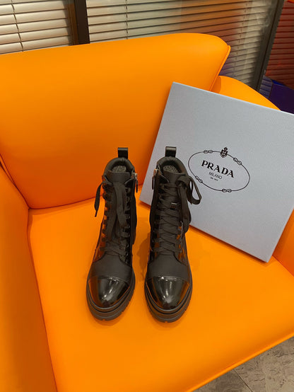 PRADA LOGO PLAQUE ANKLE BOOTS BLACK