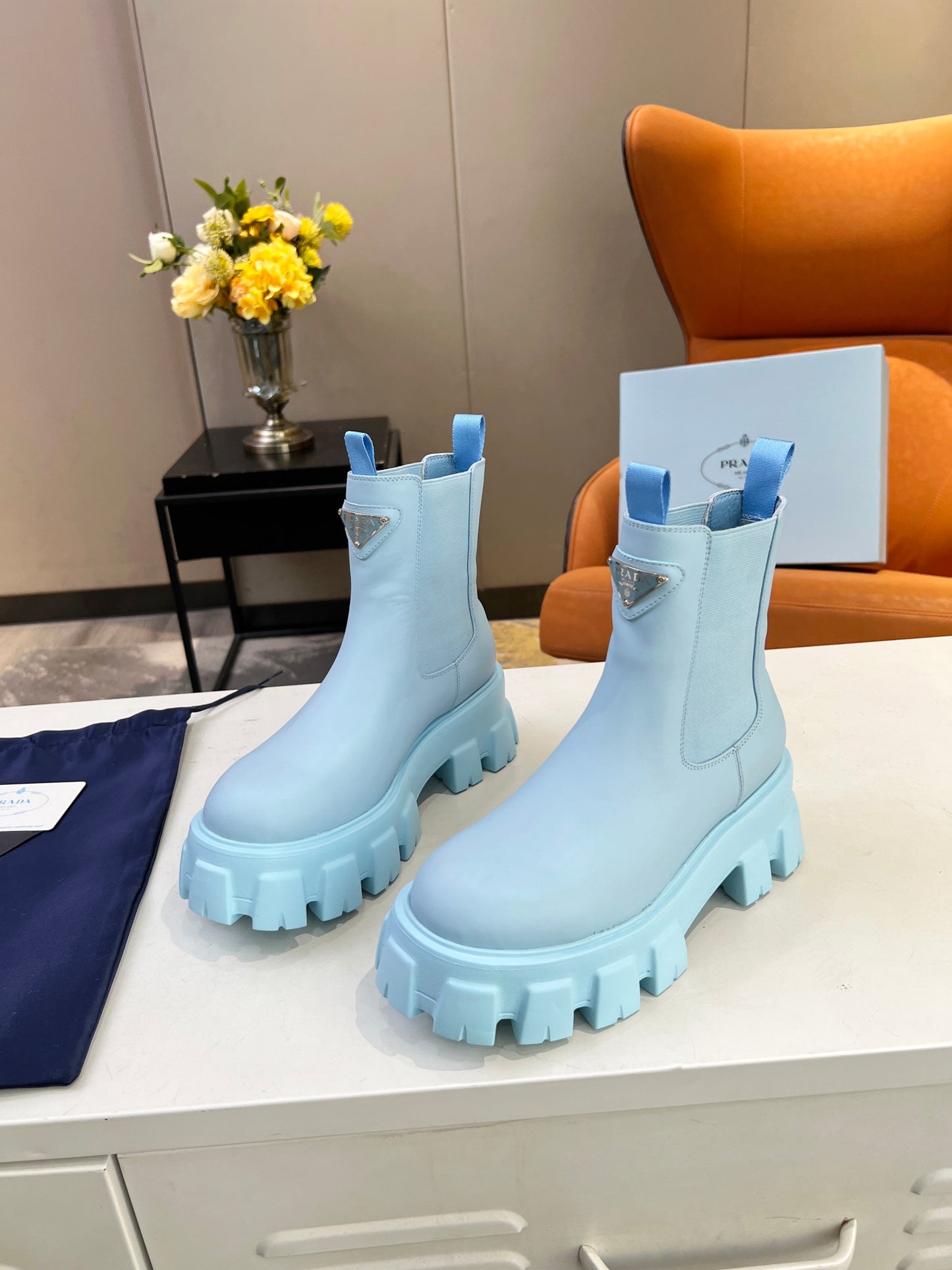 PRADA MONOLITH BRUSHED LEATHER BOOTIES BLUE